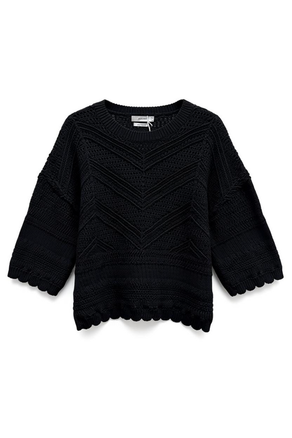 Blusa negra de punto con diseño tejido en v frontal