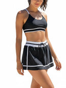 Traje de baño negro con top y falda con agujetas ajustables y línea blanca-2