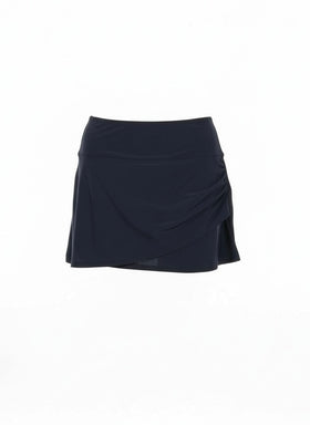 Falda negra de traje de baño con calzón integrado, y corte cruzado