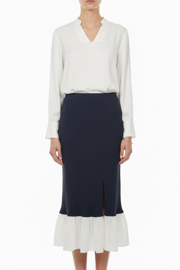 Falda azul marino entallado con Olán blanco