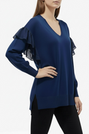 Blusa tipo suéter azul con olanes a los costados-2