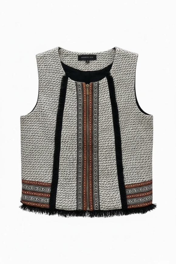 Chaleco de textura en blanco y negro con cierre dorado al frente